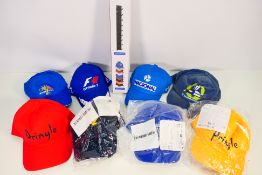 A collection of baseball caps relating to golf,