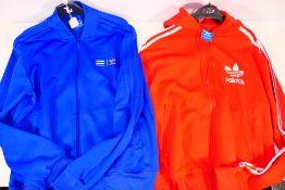 Adidas - A Pharrell Williams track top in blue (L) and a hooded top (L).