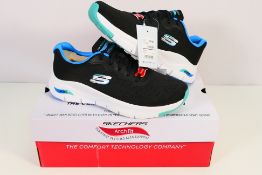 A pair of women's Skechers Infinity Cool Arch Fit trainers in black,