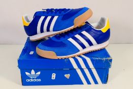 Adidas - A pair of All Team trainers in blue, UK size 9½ contained in original box.