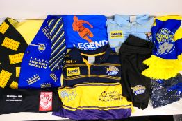 A collection of Leeds Rhinos related sportswear, scarf,