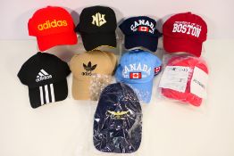 A collection of baseball caps to include Adidas, Lyle & Scott and other, generally good condition,