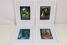 Moorcroft - four mounted and framed Moocroft prints depicting the following pottery patterns: Stars