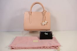A Radley pink leather satchel style bag with loop handles and shoulder strap,