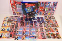 Gerry Anderson - A binder of Cards Inc Series 1 Thunderbirds trading cards with eight cards signed