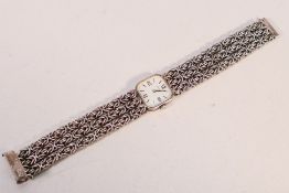 A lady's silver cased Tissot cocktail watch,