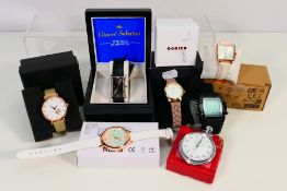 A mixed lot of boxed fashion watches, to include Gianni Sabatini, Rodier and other,