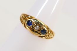An Edwardian 18ct yellow gold diamond and sapphire ring, Chester assay 1901, size M,