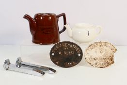 Lot to include a Genly Repaired wagon plate, plated railway spikes and two LNER tea / coffee pots.
