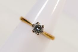 An 18ct yellow gold diamond solitaire ring, Birmingham assay 1978,