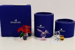 Swarovski - Lot to include a vase of flowers figure, Lucky The Rabbit and Sweet As Honey,