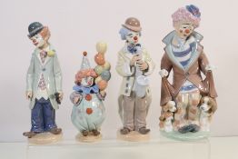 Four Lladro clown figures comprising # 5901 Surprise, # 5472 Circus Sam,