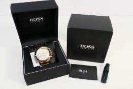 A Hugo Boss chronograph wristwatch with silvered dial and three subsidiary dials,