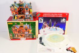 A boxed Lemax Village Collection Lighted & Animated Building,
