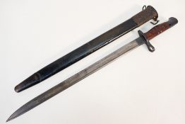 An American World War One / WW1 sword bayonet, having single edged, single fullered blade,