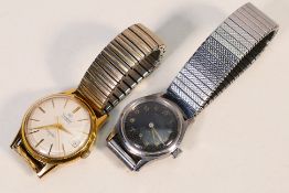Two wristwatches comprising a gold plated Transglobe Turboflite 21 jewel automatic and a Favre
