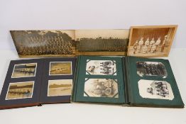 Two albums containing postcards and photographic images depicting World War One (WW1 / WWI) period