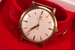 A vintage Omega manual wind wristwatch, dauphine hands and baton markers to a signed white dial,
