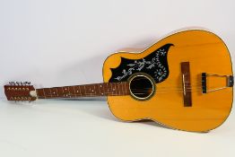 Angelica - an acoustic 12-string guitar, paper label within marked Angelica A626, serial number 41.