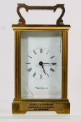 A Mappin & Webb carriage clock, signed enamel dial with Roman numerals,