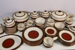 A quantity of Denby Stoneware table wares decorated in the Potters Wheel pattern to include plates,