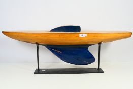 A vintage scratch built pond yacht on steel display stand