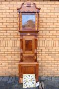 A longcase clock,An interesting mid 19th century oak and mahogany cased 8-day longcase clock,
