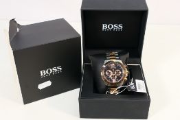 A Hugo Boss chronograph wristwatch with black dial and three subsidiary dials, model HB2431202849,
