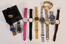 A group of dress watches, to include a gold plated Raymond Weil wristwatch, with date aperture,