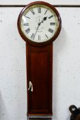 An imposing tavern-style wall clock,