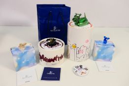 Swarovski figures to include two limited edition Mini Mo figures, Platinum White and Capri Blue,