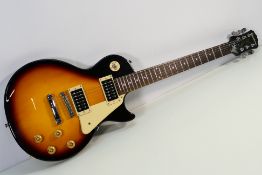 Epiphone - an electric six string guitar, Epiphone Les Paul 100,