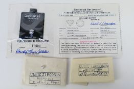 Three loose brilliant cut cubic zirconia, each of approximately 1 carat.