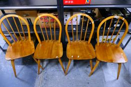 Ercol - Four light wood, spar back chairs,