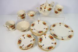 A collection of Myott, Son & Co tea wares decorated in the Moresque pattern, thirty pieces.