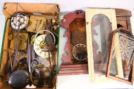 Two boxes containing a quantity of various clock parts. [2].