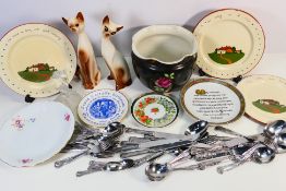 Lot include Two ceramics figures of cats, decorative plates, pot and silverware (Folks,