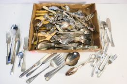 A collection of plated flatware.