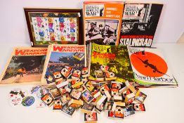 A collection of Magazines, a framed Royal Mail smilers stamps,