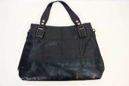 A black leather handbag with nickel black detail,