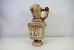 A large continental pottery wine jug and cover,