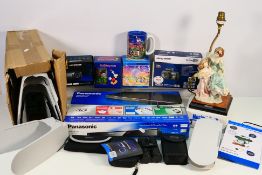 A mixed lot to include a Panasonic 3D Blu Ray player, table lamp, Disney items and other.