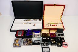 A collection of cufflinks to include novelty examples, part boxed.