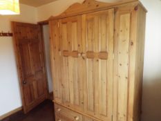 A pine Double Wardrobe, 207 cm (h) x 139 cm (w) x 55 cm (d),