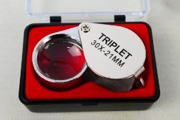 A Jeweller's Loupe, 30 times magnification, cased,