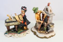 Two large Capodimonte pieces, a chimney sweep and a pianist, largest approximately 31 cm (h).