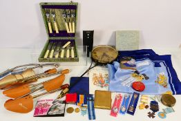 A mixed lot to include cased flatware, Masonic and similar jewels including one silver gilt example,