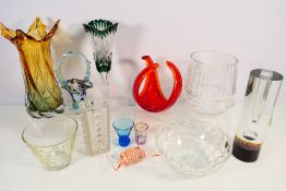 A quantity of decorative art glass to include vases, bowls, centrepiece and other.