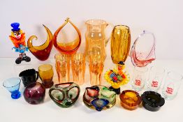 A quantity of decorative glassware to include a vintage lemonade set, vases,