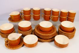 A quantity of Hornsea Pottery Saffron pattern dinner and tea wares, approximately 52 pieces.